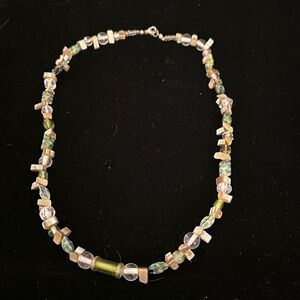 Glass and stone bead necklace in muted green and beige tones